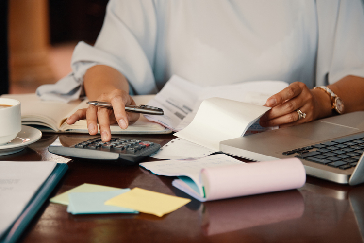 entrepreneur-working-with-bills-1