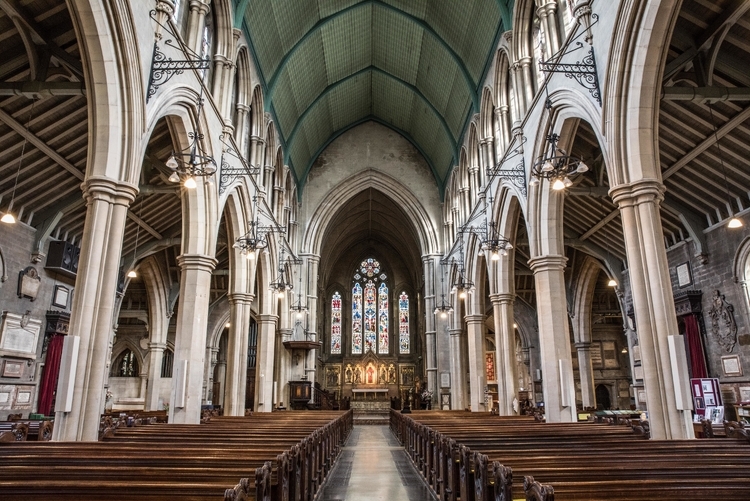 inside-view-church-with-religious-icons-windows-stone-arches-1